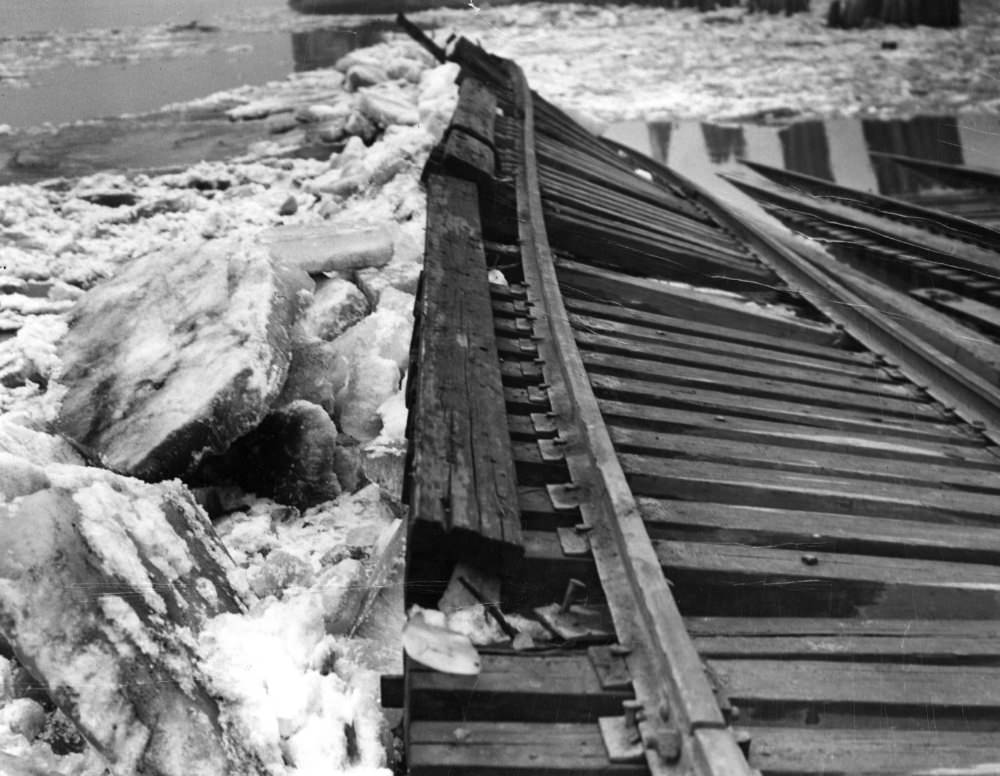 The breakup of the ice jam on Feb. 26, 1936, mangled the Missouri Pacific Railroad approach to a ferry landing at the foot of Davis Street, in Carondelet. The ferry ran to East Carondelet, Ill.