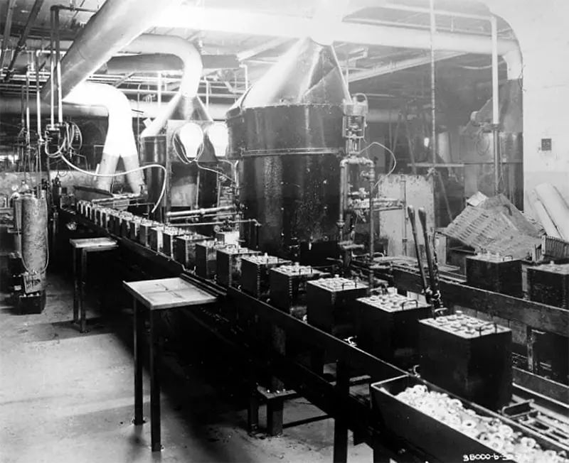 Batteries on conveyor, 1924.