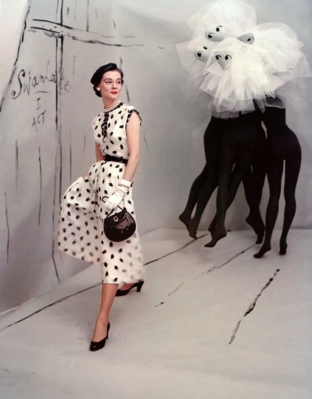 Kathy Dennis in dress by Mollie Parnis, background by Marcel Vertés, Horst, 1953