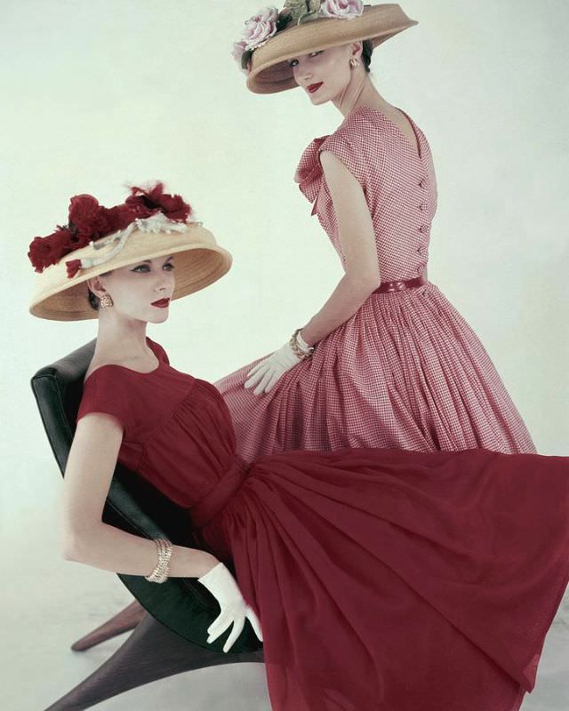 Evelyn Tripp and Joan Friedman in dresses by Mollie Parnis and flowered hats by Adolfo of Emme, Vogue, April 15, 1956