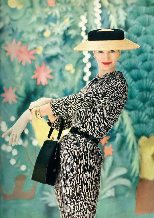Sunny Harnett in silk printed sheath with short bolero by Mollie Parnis, Vogue, 1956