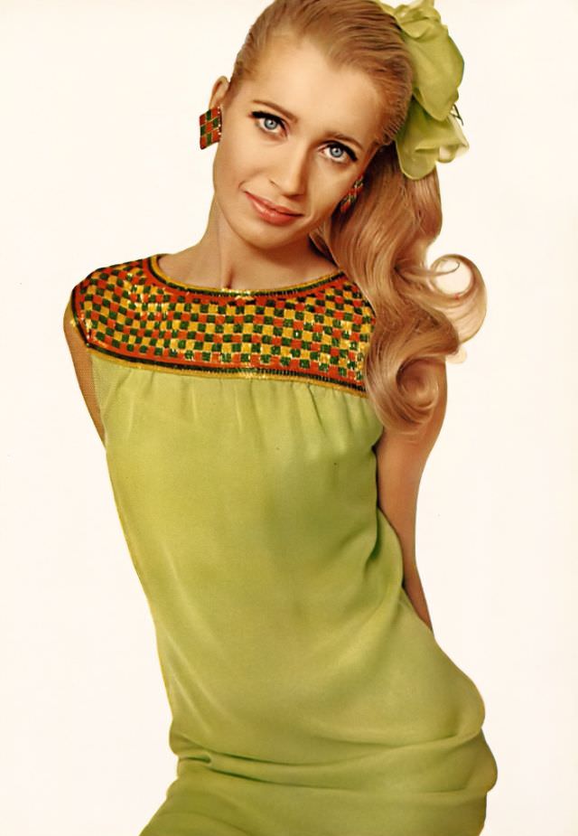 Isa Stoppi in celery-green short silk chiffon smock with sparkling orange and green beaded yoke by Mollie Parnis, earrings by Charles Elkaim, Harper's Bazaar, February 1966