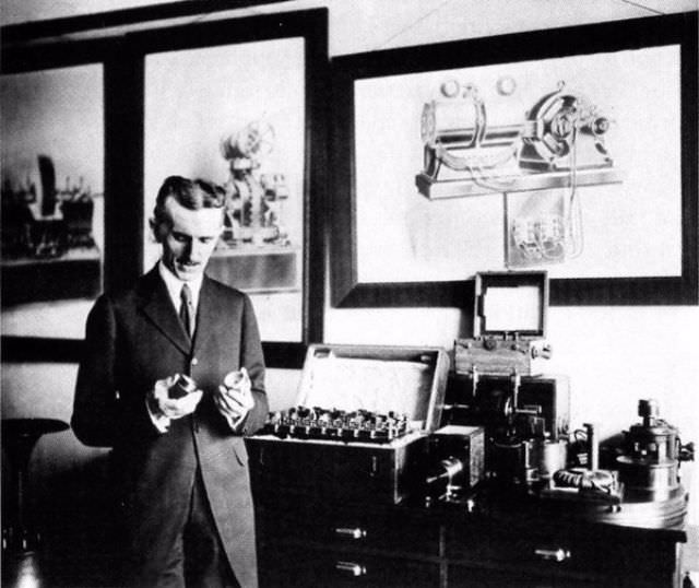 Tesla is seen in his New York City office in 1916. The inventor often crossed the street to Bryant Park to feed the pigeons there. The drawings behind Tesla depict his steam engine design.