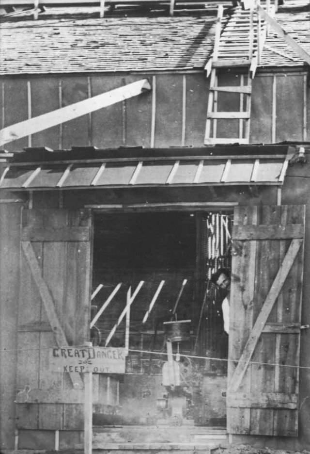 Tesla looks out the door of his laboratory in Colorado Springs. The image was taken in 1899.