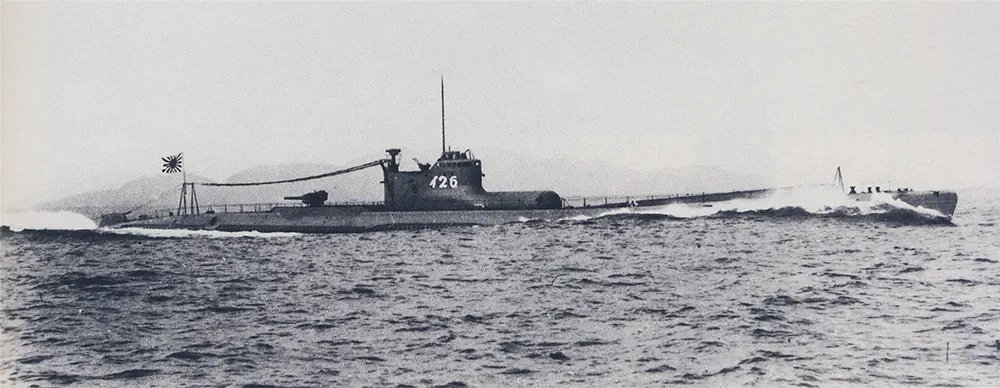 Japanese submarine I-26. The bulbous plane hangar and the catapult are visible forward of the conning tower.