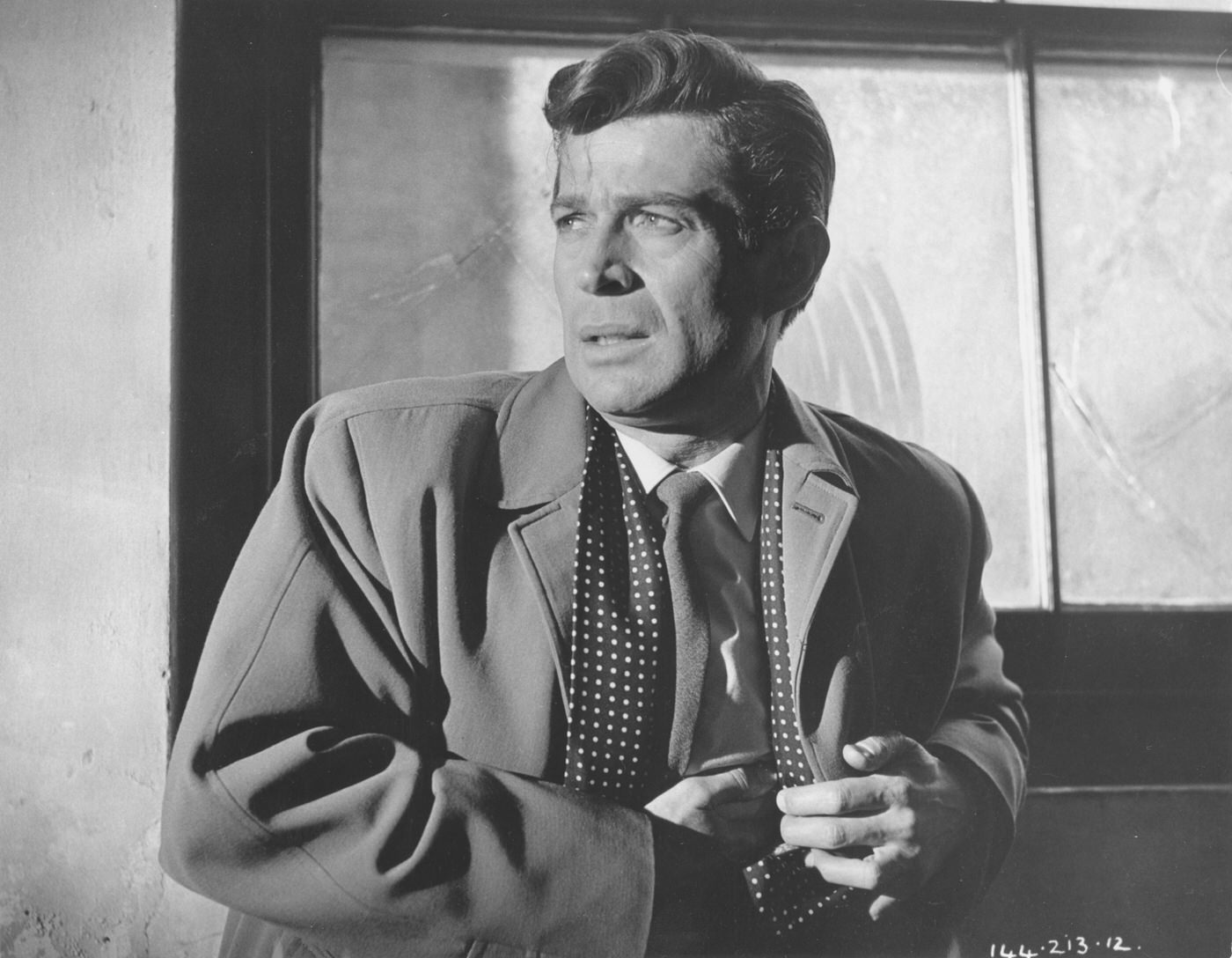 George Nader in Nowhere to Go (1958)