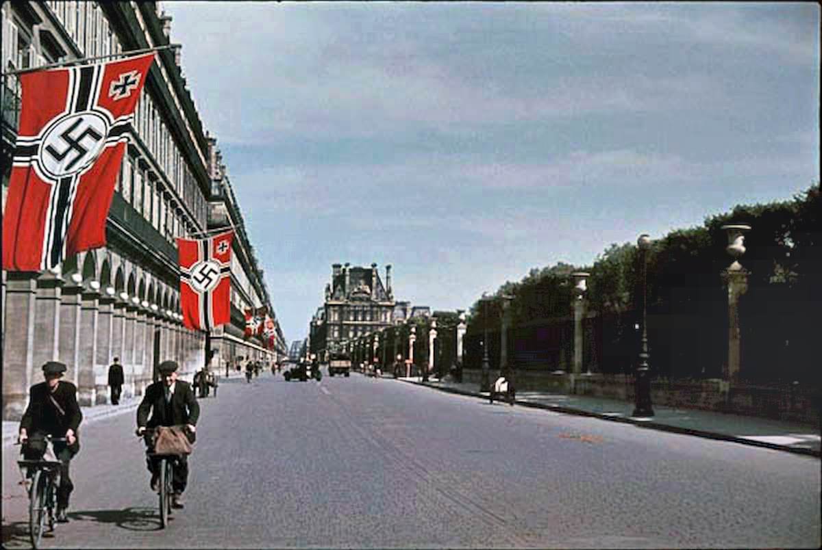 Giant Swastikas line the streets of the French capital.