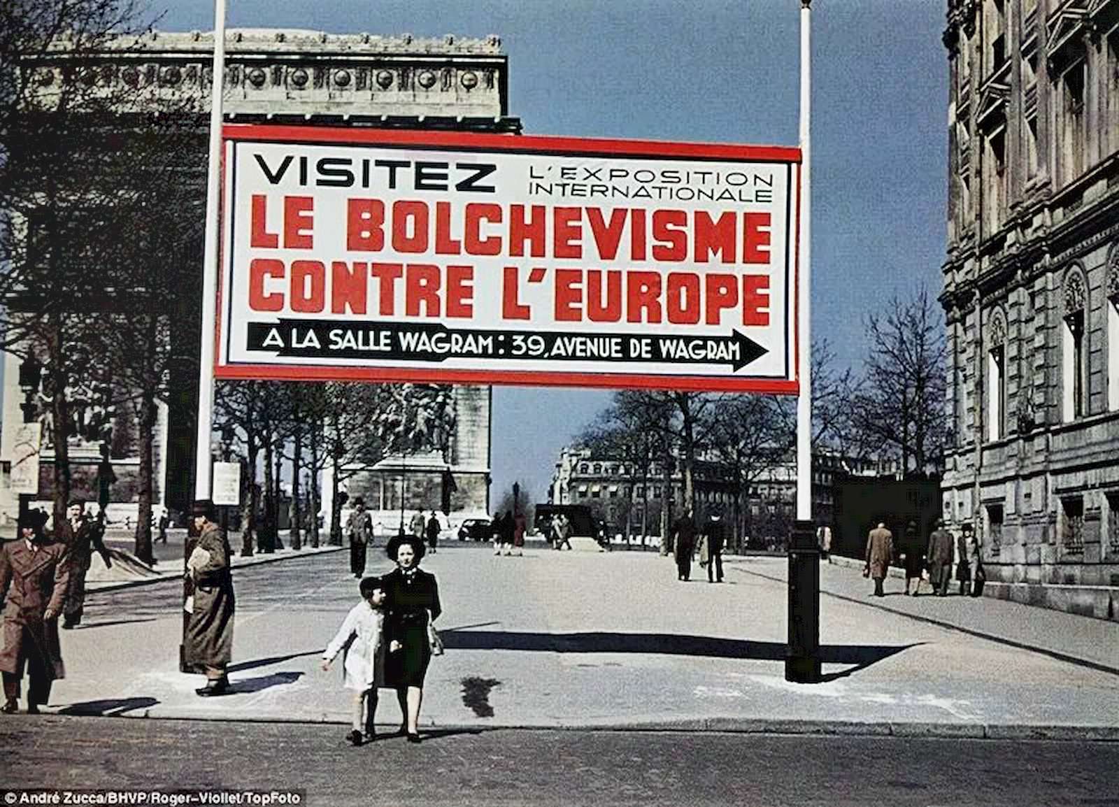 A sign advertises Europe Against Bolshevism exhibition, held under the auspices of Nazi front organization the anti-Bolshevik Action Committee in Paris in 1942.
