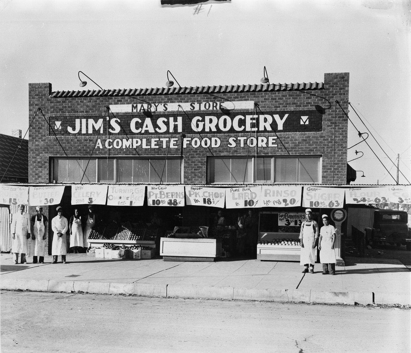 Employees in Front of Jim's Cash Grocery Store, 1930s