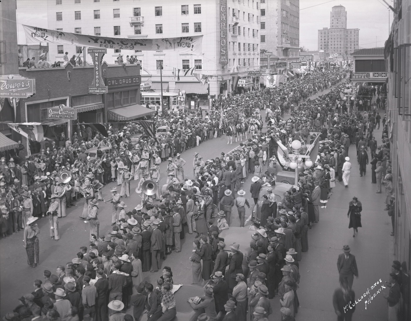 Jaycee Rodeo Parade Moving South on Central Past Monroe, 1930s