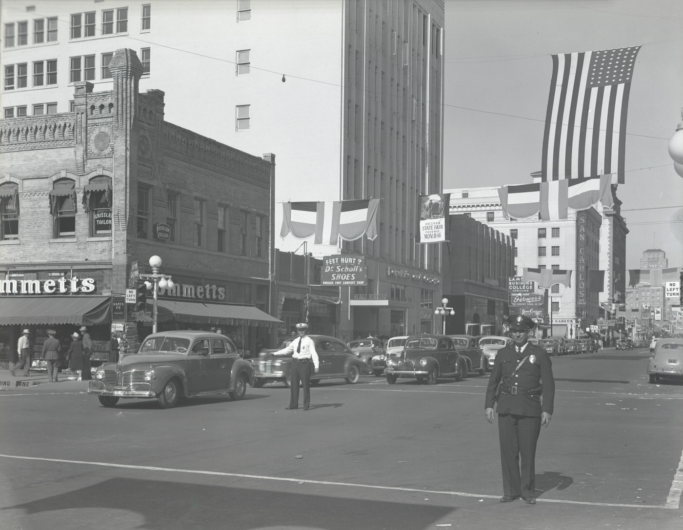 Charlie Thomas and Lebley Mofford Directing Traffic at Central Avenue and Adams Street, 1930s