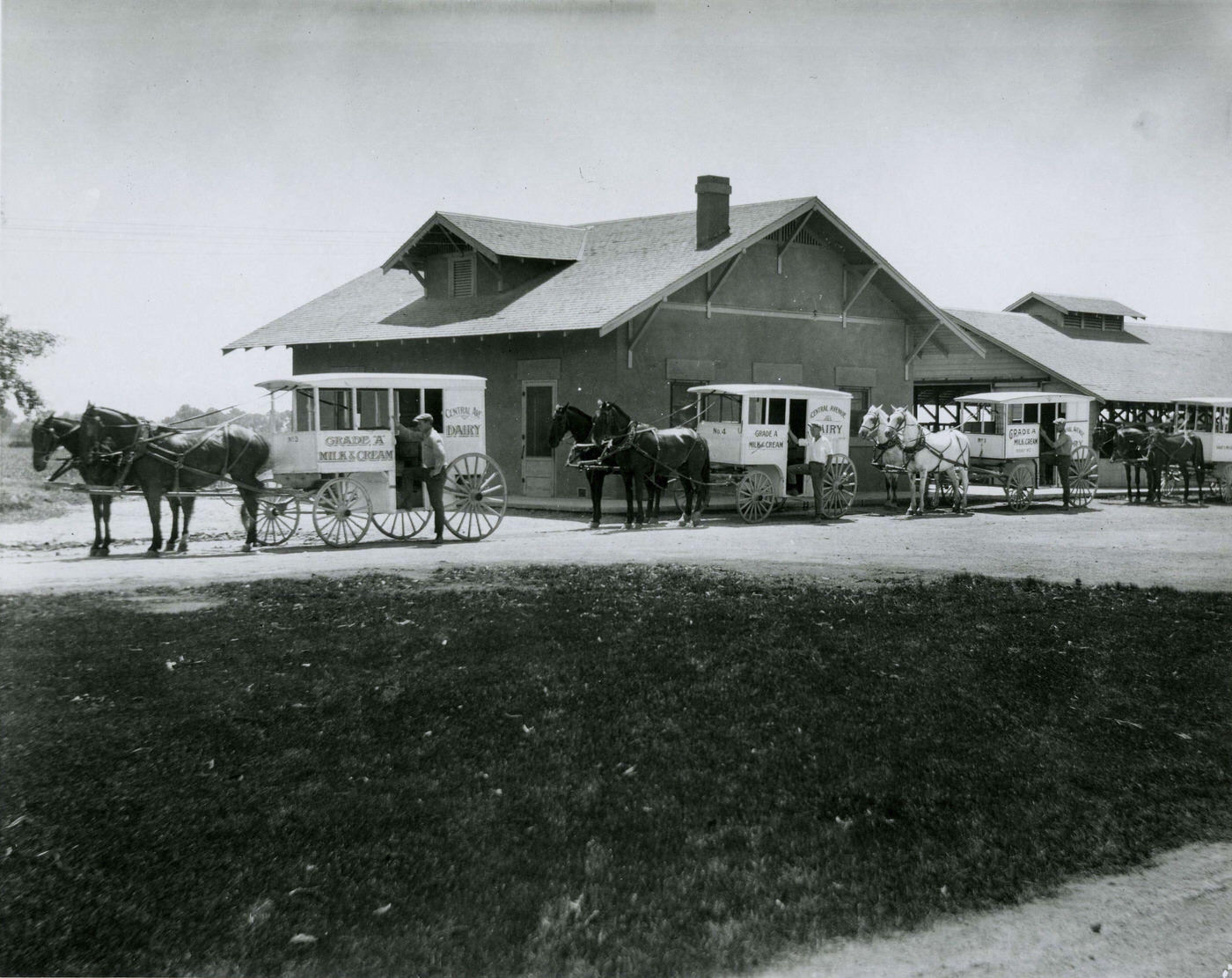 Central Avenue Dairy with Horse-Drawn Milk Wagons in Front, 1930s