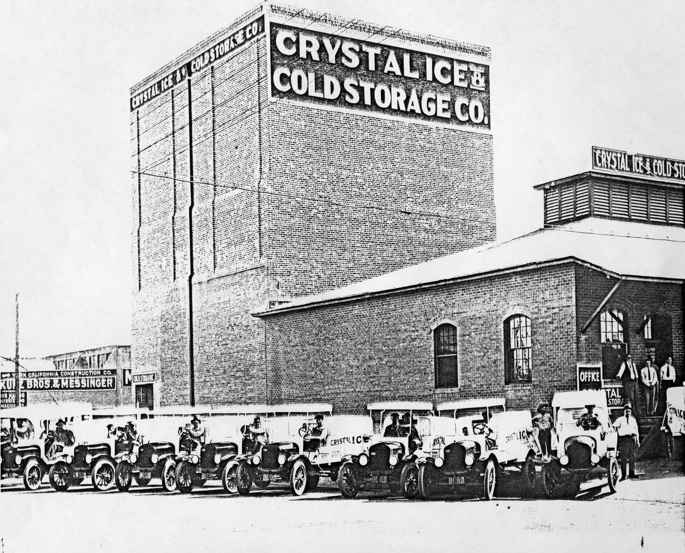Crystal Ice & Cold Storage Co.: Exterior of Building and Trucks, 1930s