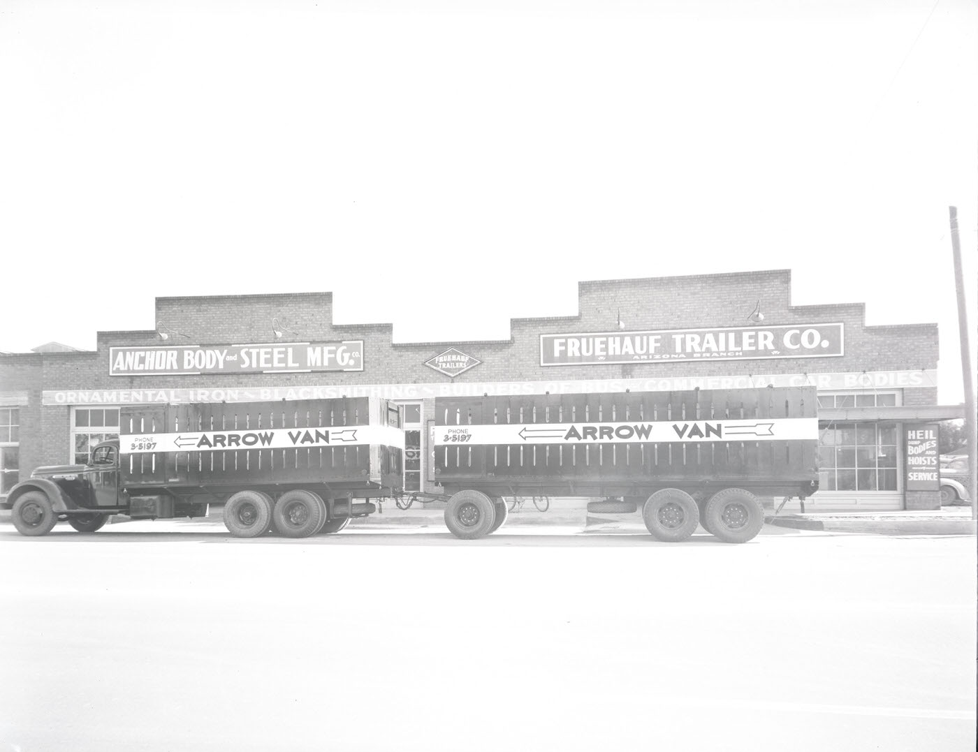 Fruehauf Trailer Co. Building Exterior and Trucks, 1941