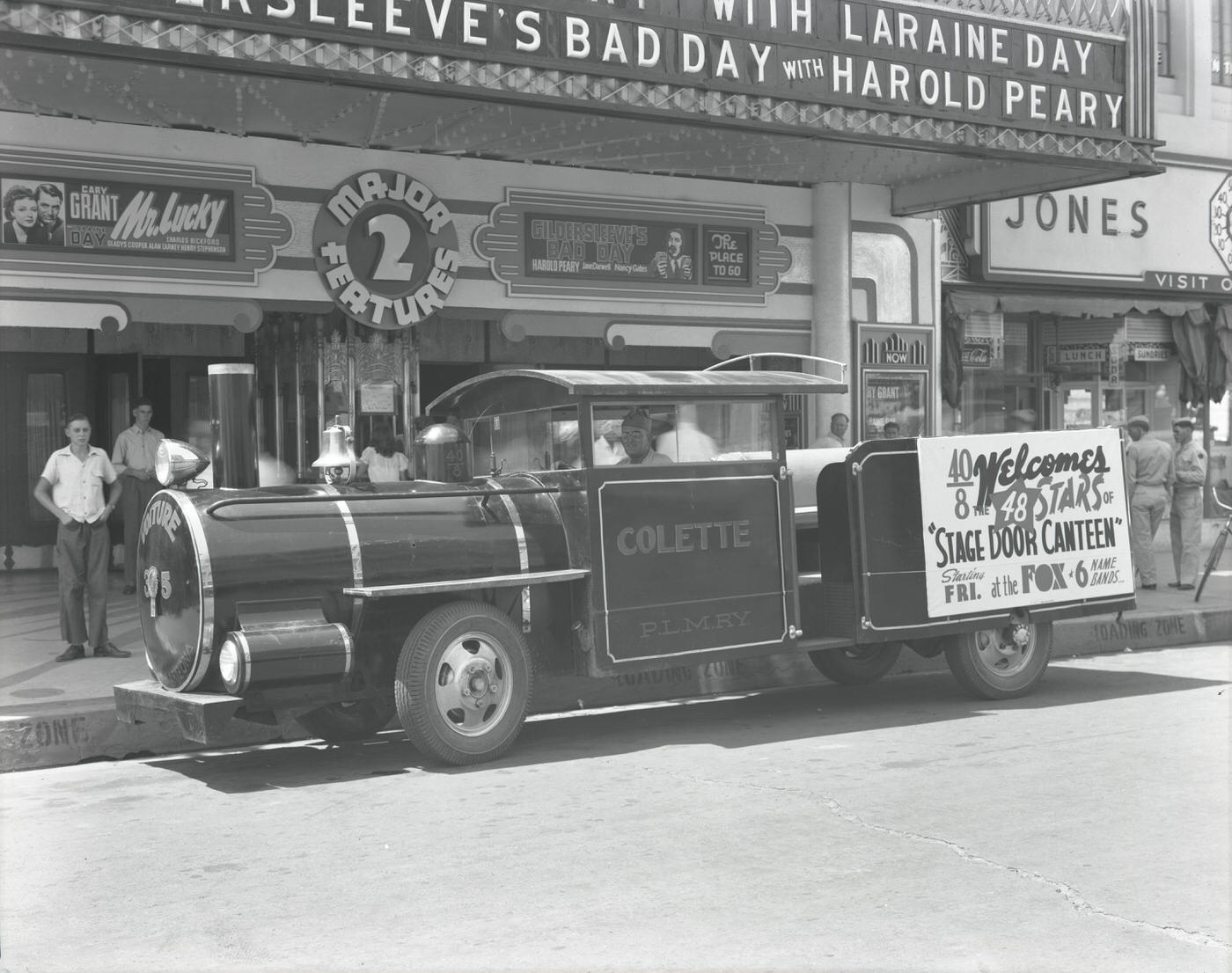 Vehicle and People Outside the Fox Theatre Promoting "Stage Door Canteen", 1943