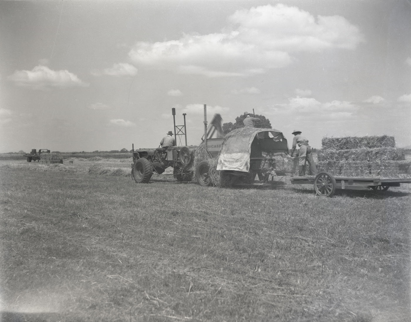 Tractor Pulling a Trailer Filled with Hay, 1943