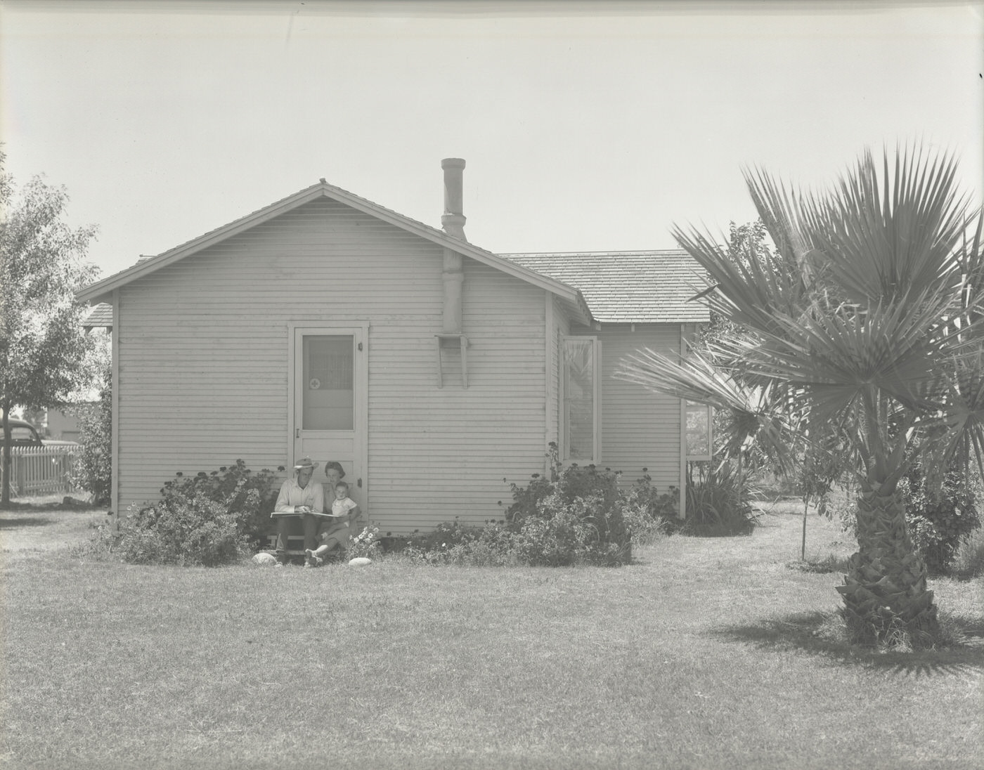 Family in Front of a Ranch House., 1943