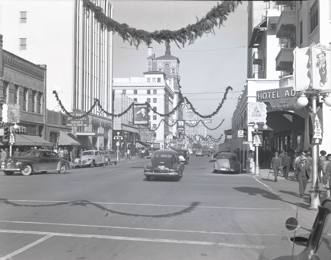 View looking north on Central Ave. from approximately the intersection of Adams and Central. The Hotel Adams and San Carlos Hotel are visible, 1944