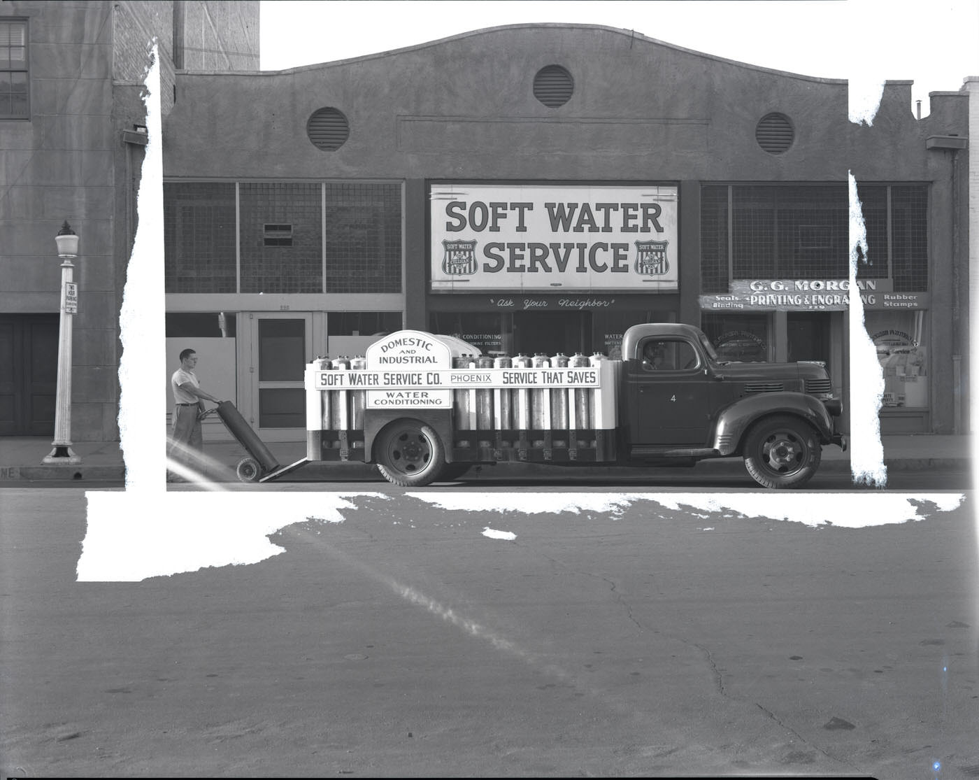 Soft Water Service Co. Building Exterior and Truck, 1944