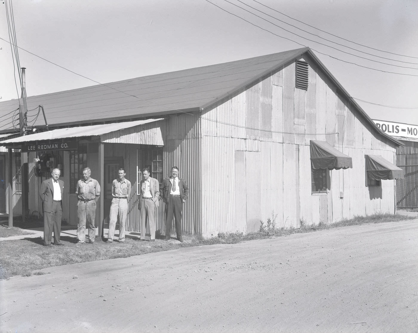 Lee Redman Co. Employees in Front of Building, 1945