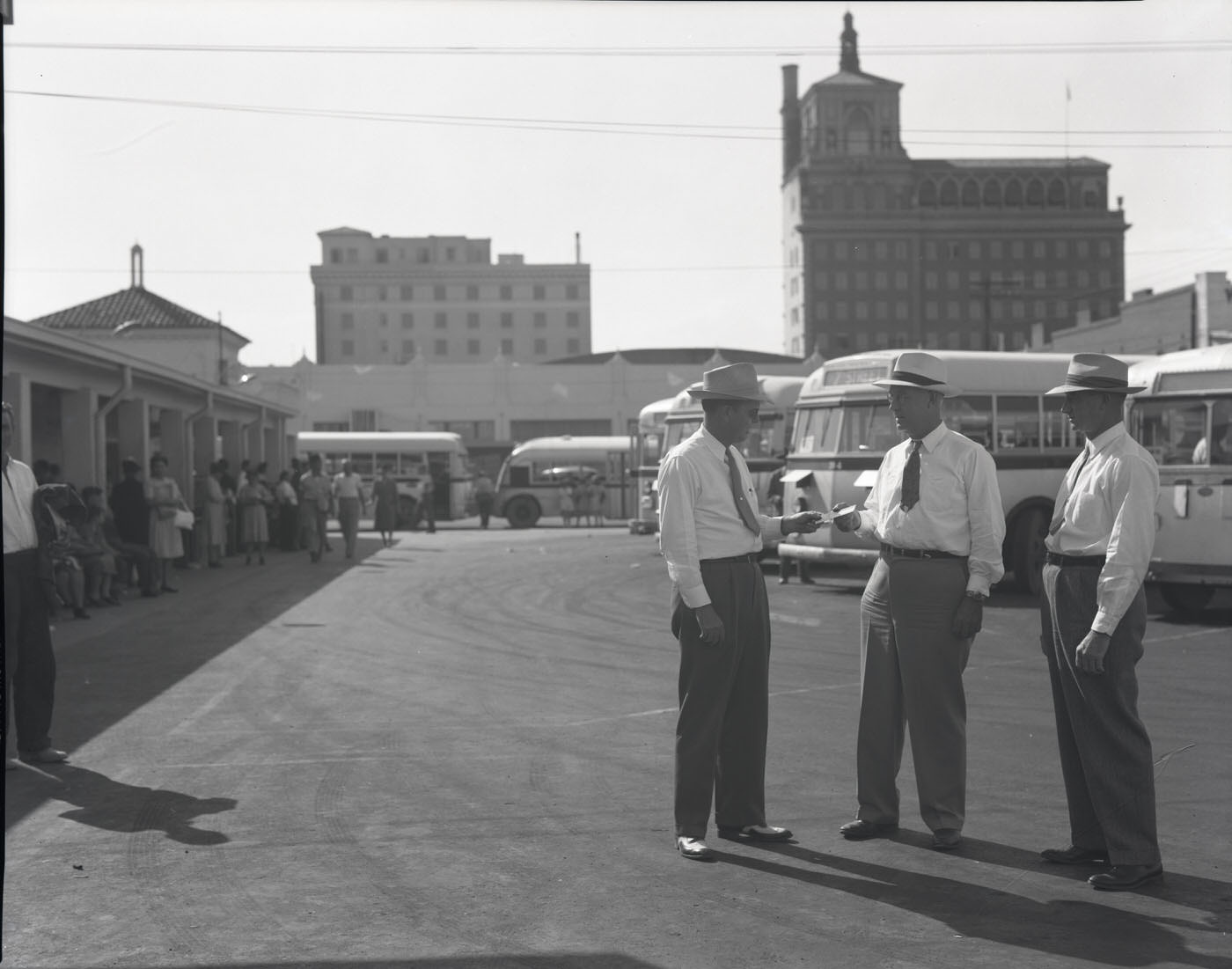 Menderson Bus Lines Buses with Three Men in Foreground, 1945