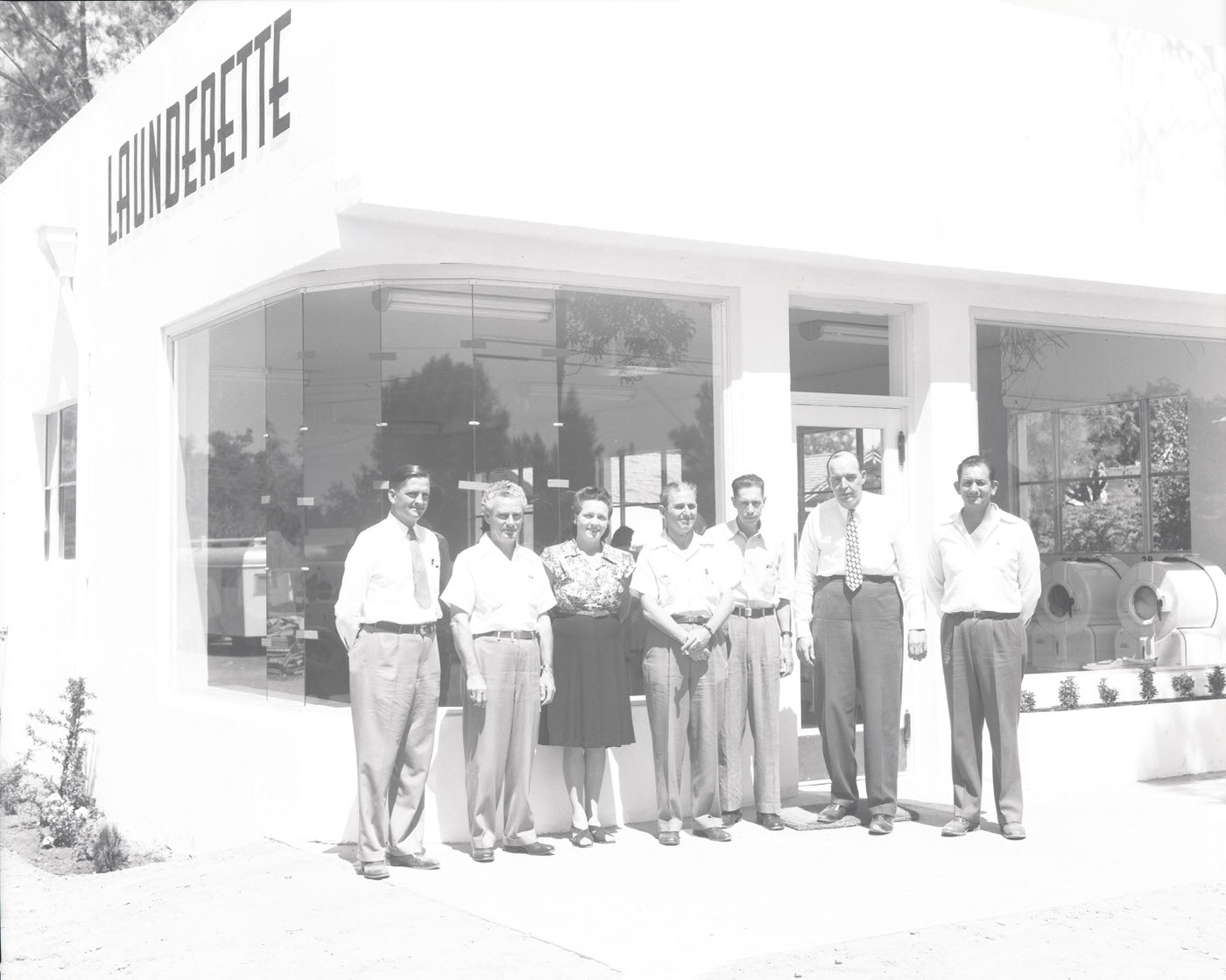 People Standing in Front of Laundrette, 1946