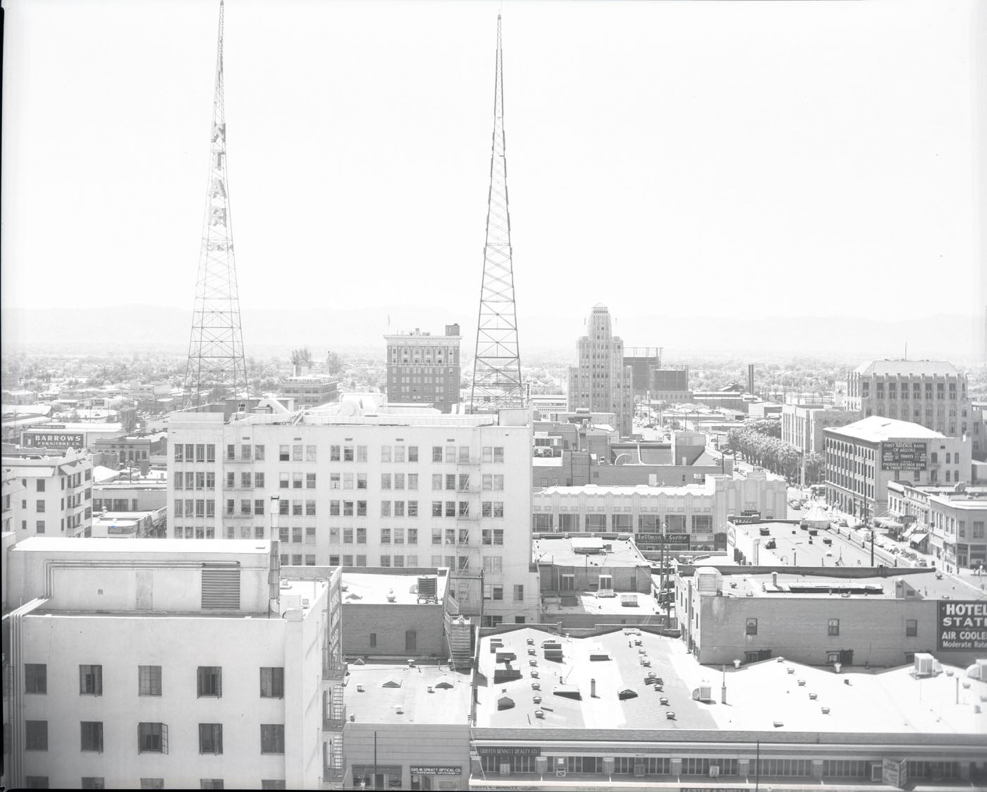 Cityscape of Phoenix, 1946. View looking south from a rooftop at approximately Central and Van Buren. KTAR's towers on the Heard Building are visible in the foreground.