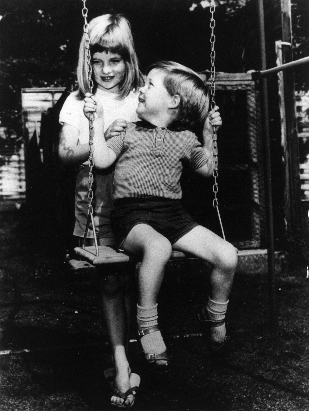 Lady Diana Frances Spencer playing with her brother Charles Edward Maurice.