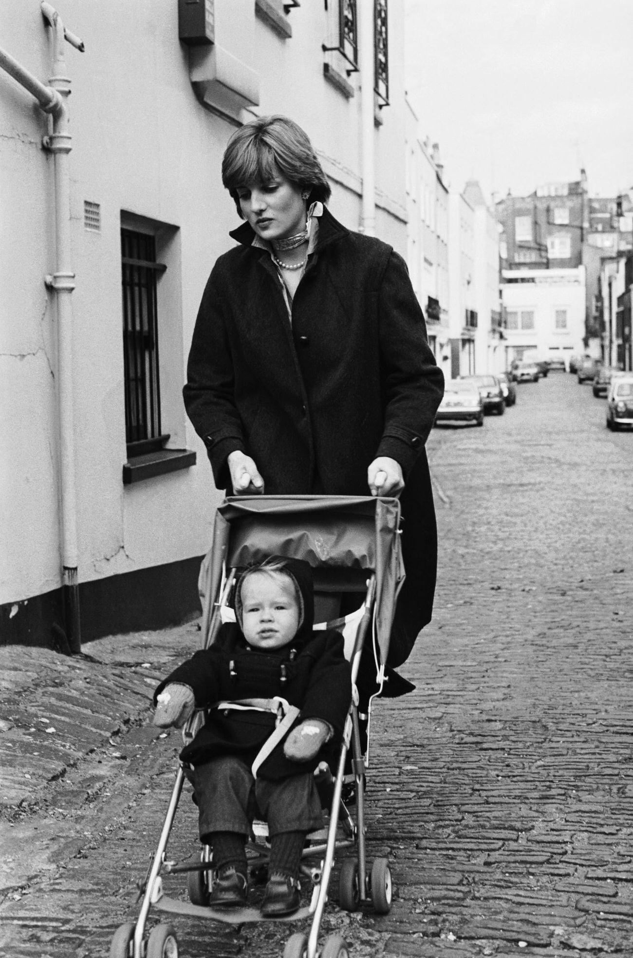 Lady Diana Spencer pushing a pram in Eton Square, 1980