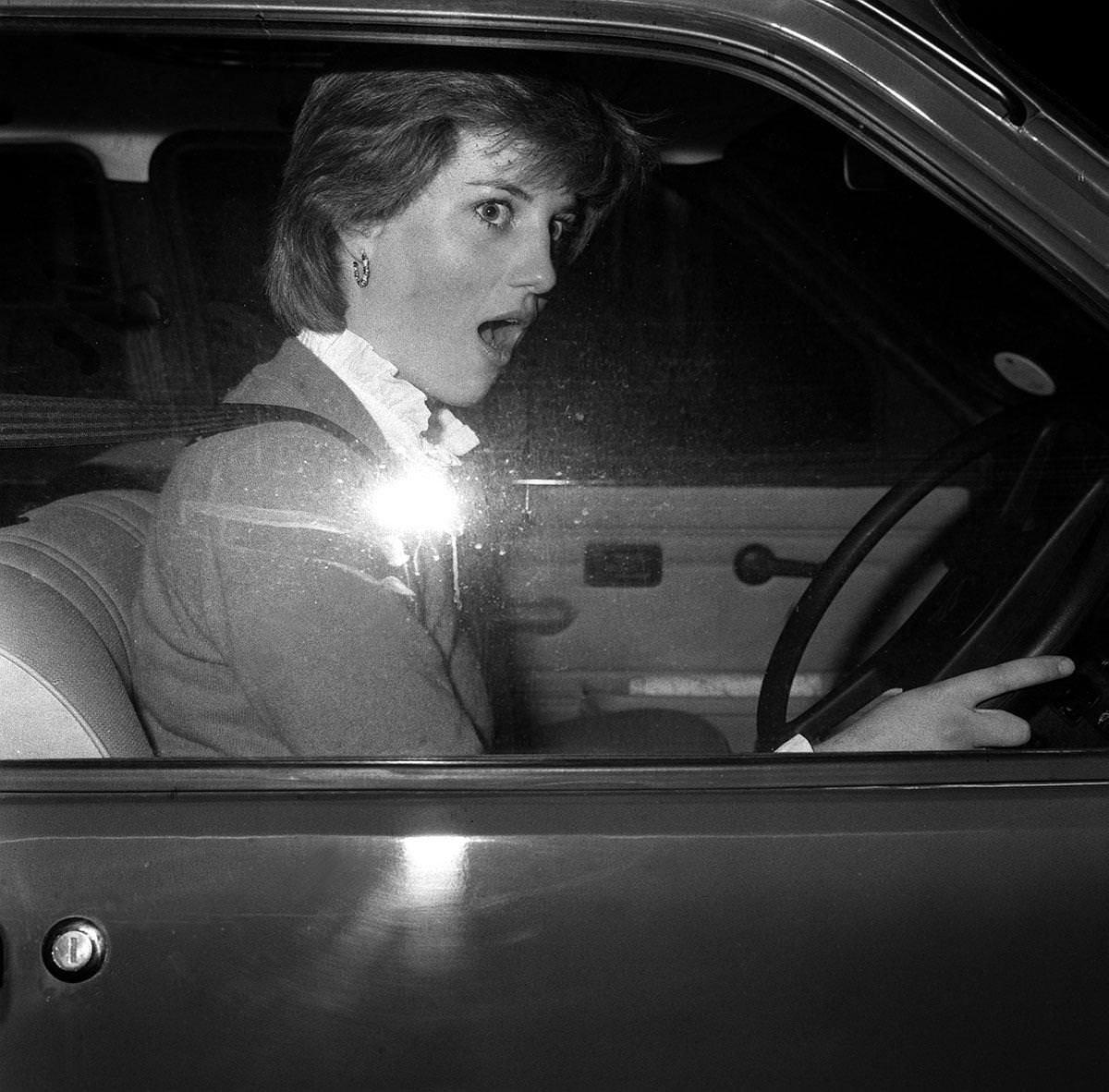 Lady Diana look of astonishment as she stalls her car - a new Mini Metro - outside her Earl's Court flat when leaving for her job as a teacher at a kindergarten in Pimlico, London.