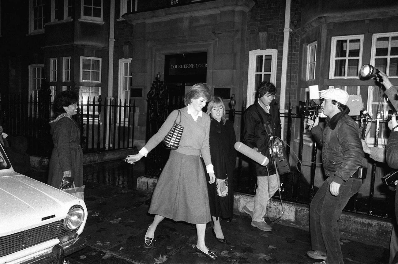 Lady Diana Spencer who is engaged to Prince Charles is hounded by the media at her flat in Coleherne Court in November 1980.