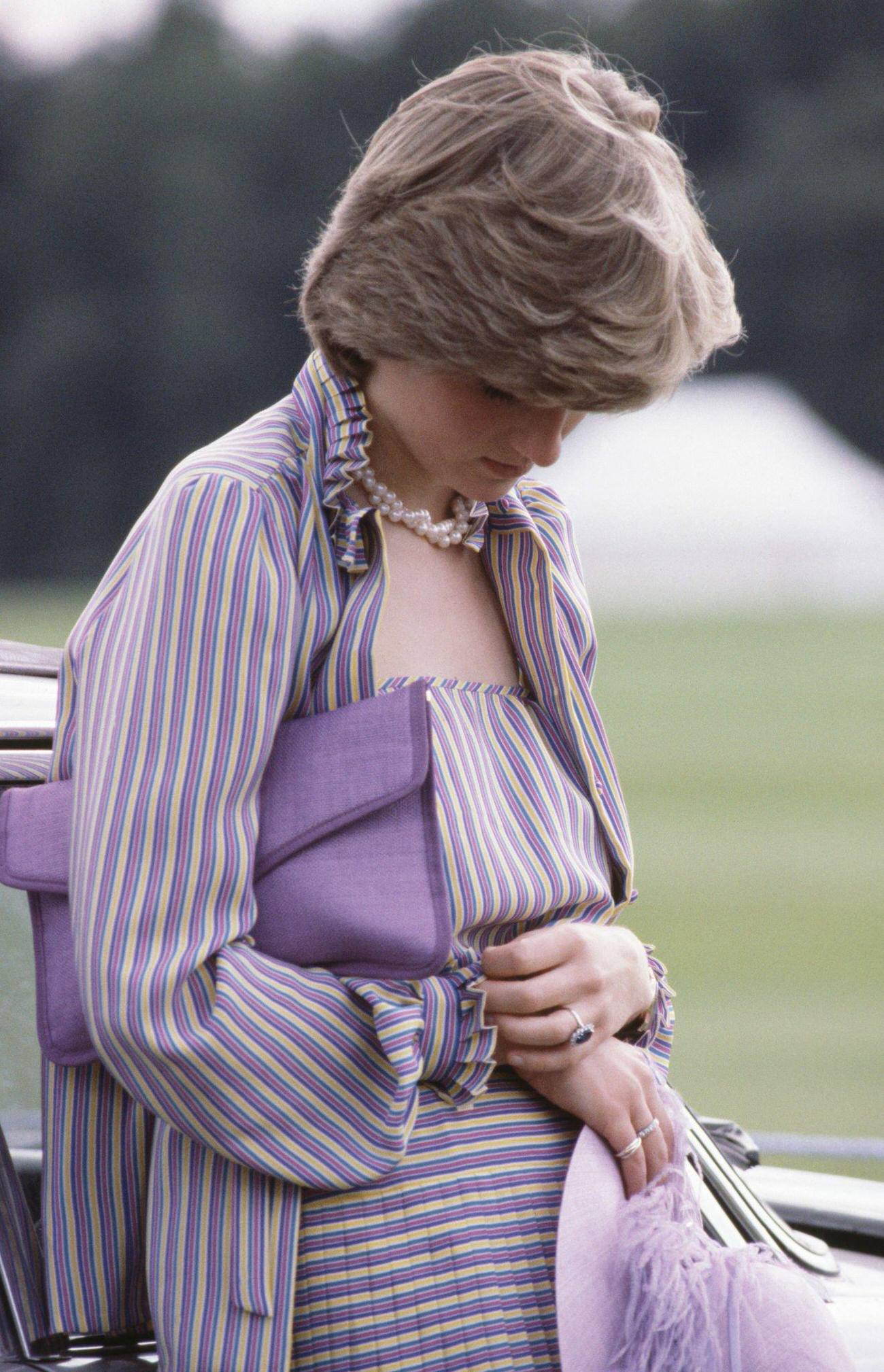 Princess Diana as she looks down.