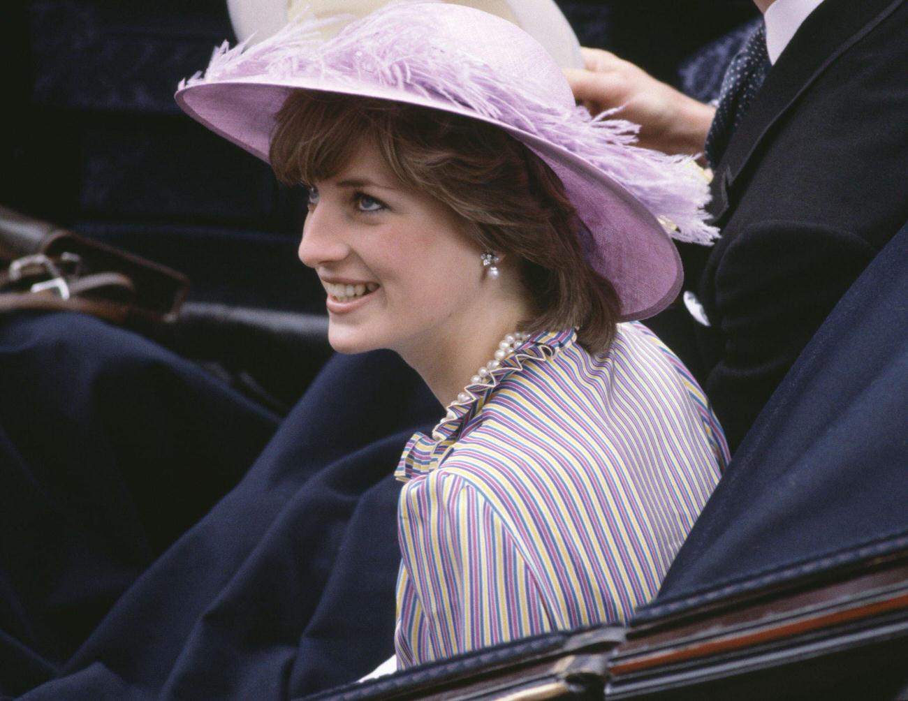 Lady Diana Spencer in a purple hat, 1980