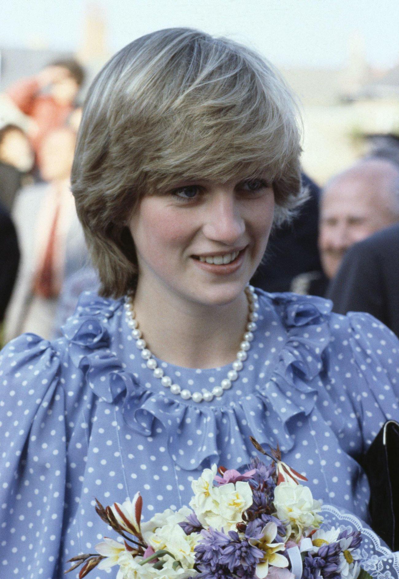 Princess Diana holding a bouquet of flowers, 1981