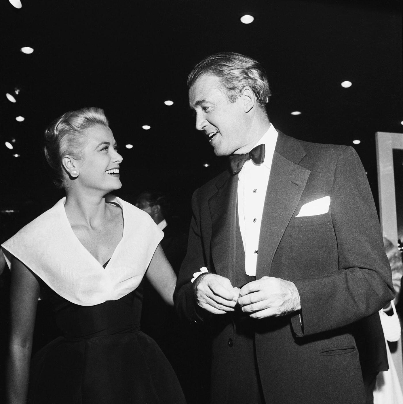 Grace Kelly with co-star James Stewart, at the Hollywood premiere of the film, 10th August 1954.
