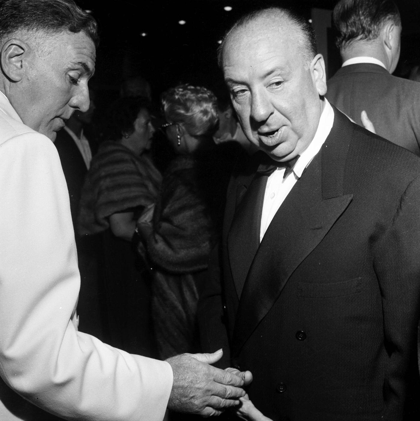 Alfred Hitchcock attends the premier of "Rear Window" in Los Angeles