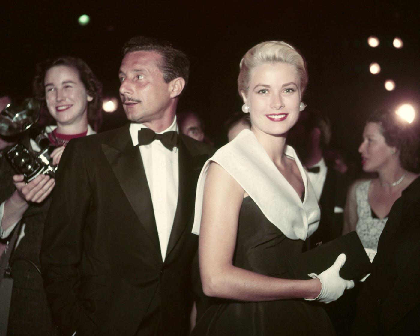 Grace Kelly attends the premiere of the film 'Rear Window' with fashion designer Oleg Cassini