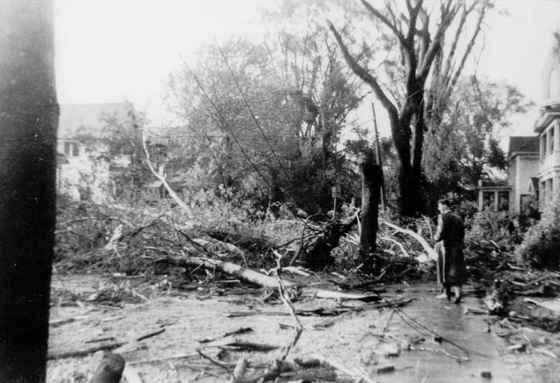 Man walking on street after tornado
