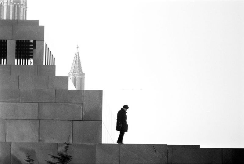 A man walking on the platform of Lenin's mausoleum.
