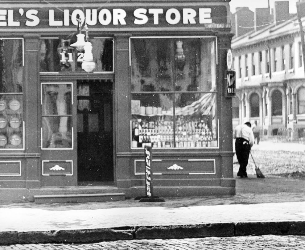 Store front of liquor store on Chouteau Avenue, 1900.