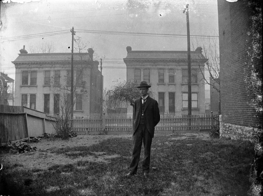 Edmund poses in suit and hat in winter, 1900