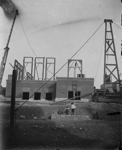 Boys at construction site, 1900