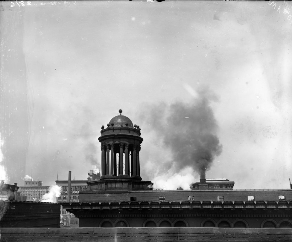 A rooftop view of the domed bell tower at the top of the Jaccard Building, 1900