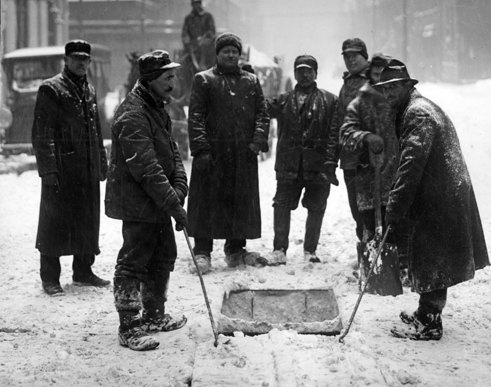 Workers in Snowy Street, 1900