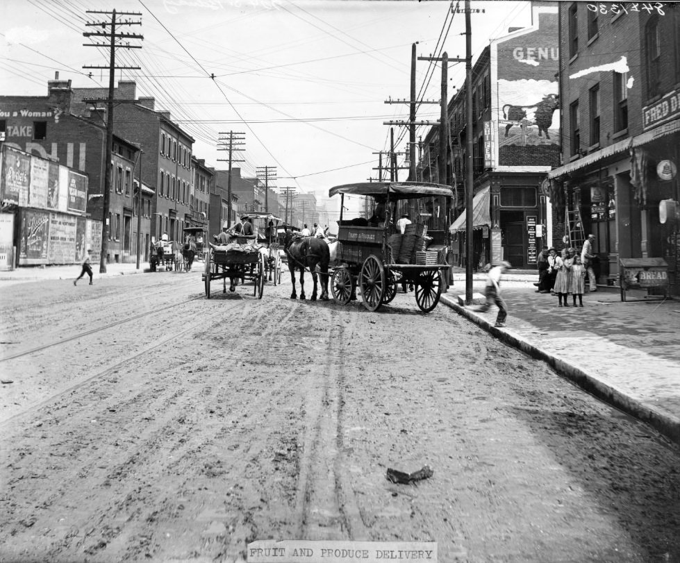 Horse-drawn wagon delivering fruit and produce to a business, 1900.