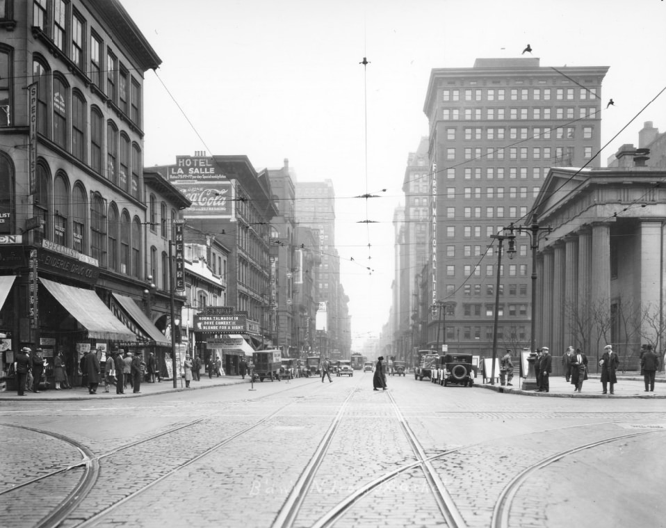 Broadway North from Market Street, 1900. The old Courthouse is visible on the right, theaters and a hotel are visible on the left across from the Courthouse.