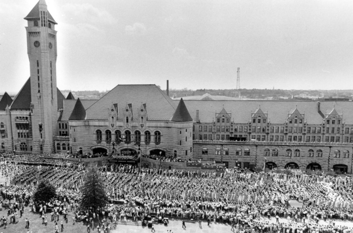 Overall view of Union Station as world's largest marching band, some 5000 strong, marches through, 1985