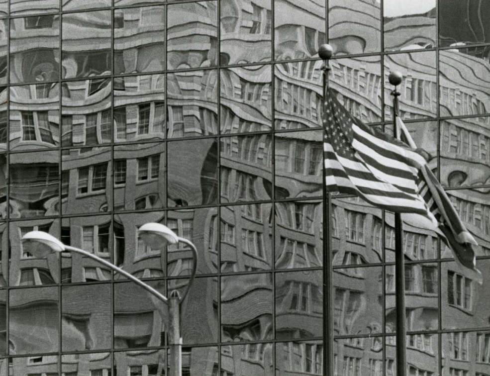 Reflections on windows of a downtown St. Louis office building, 1981