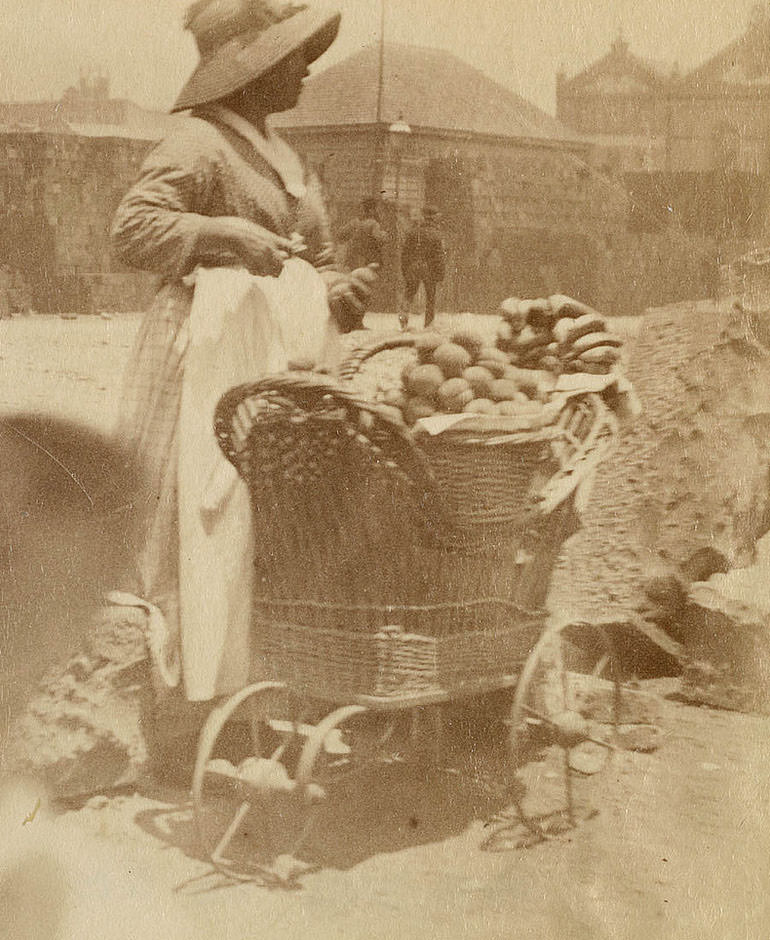 Woman selling fruit from small barrow Sydney, 1880s