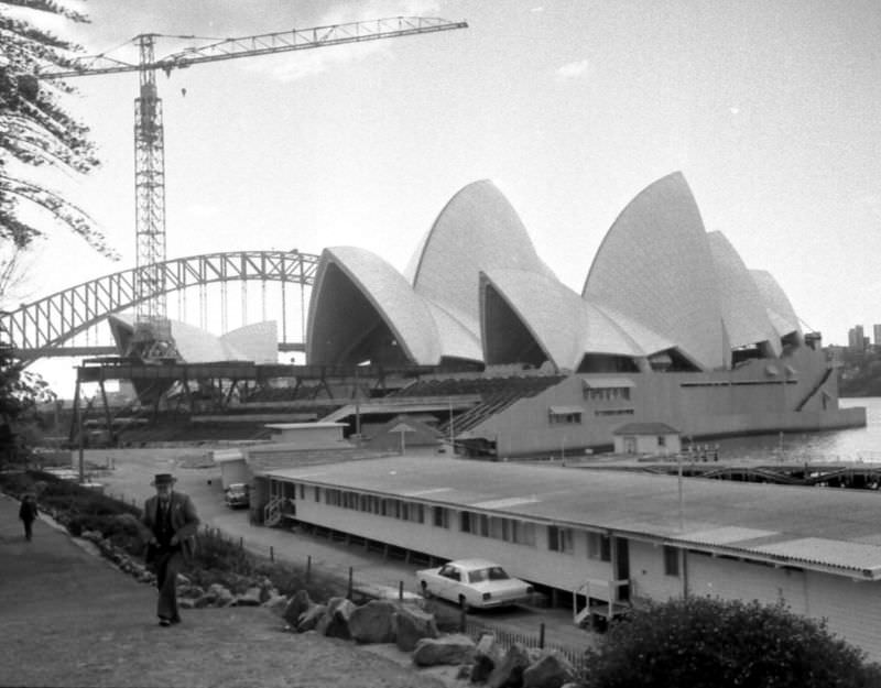 The Opera House under construction viewed from the Botanical Gardens, Sydney, 1968